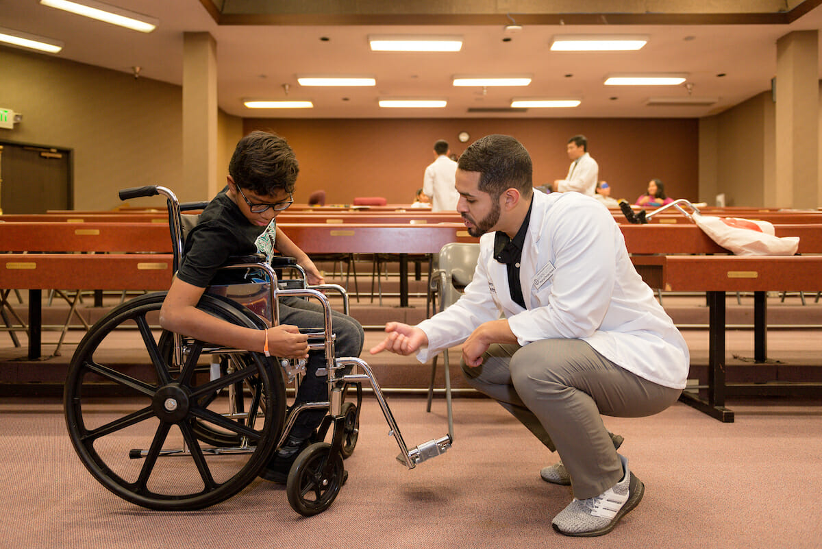 WesternU students lead Disabilities workshops to middle and high school students during Pomona Health Career Ladder and American Indian Health Career Ladder Saturday, January 19, 2019. Workshops included how disabilities awareness, communication disorder awareness, blindness awareness, counting medications, autism awareness, hearing impairments, physical disabilities, physical therapy assistive devices, sign language, nursing and disabilities, traumatic brain injury, stroke, cardiac abnormalities and dental care, among many others. Fourth-year College of Dental Medicine students Ian Prins present to parents about dental disabilities.