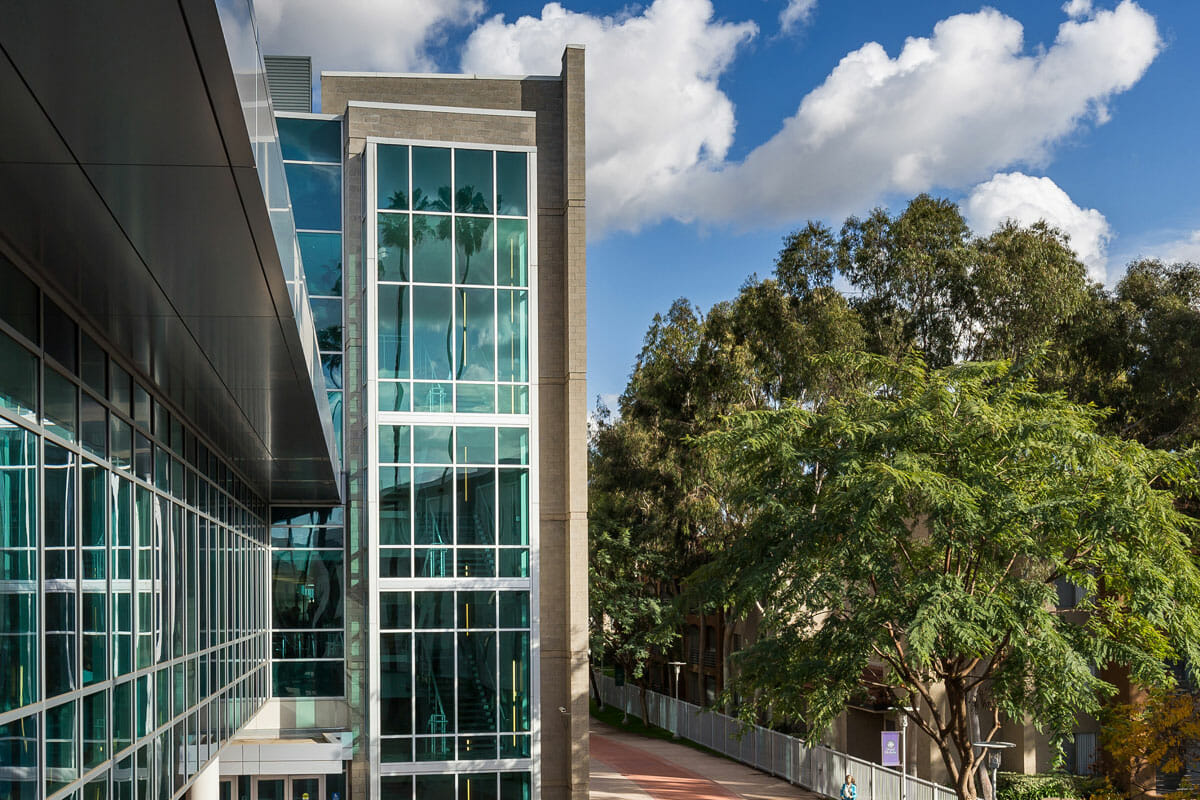 Health Education building windows and campus trees