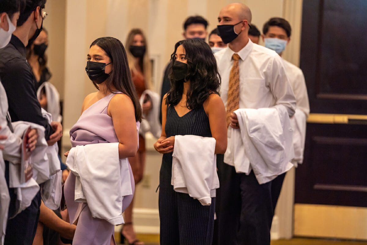 Five students in dental white coat ceremony