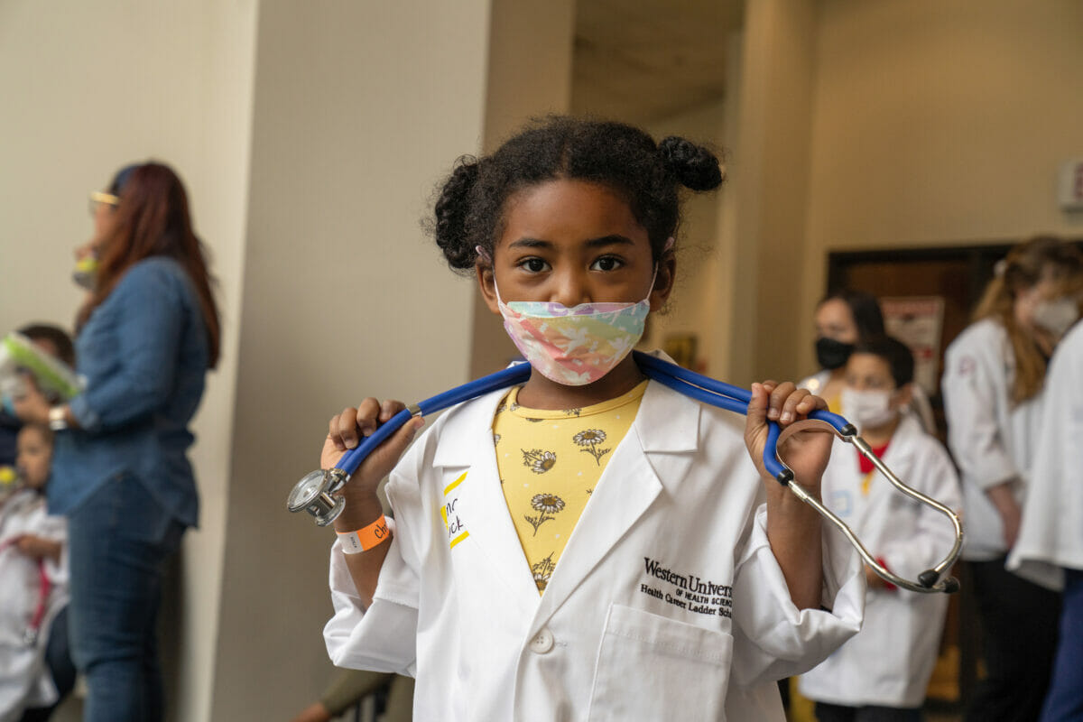 Girl Holding Stethoscope