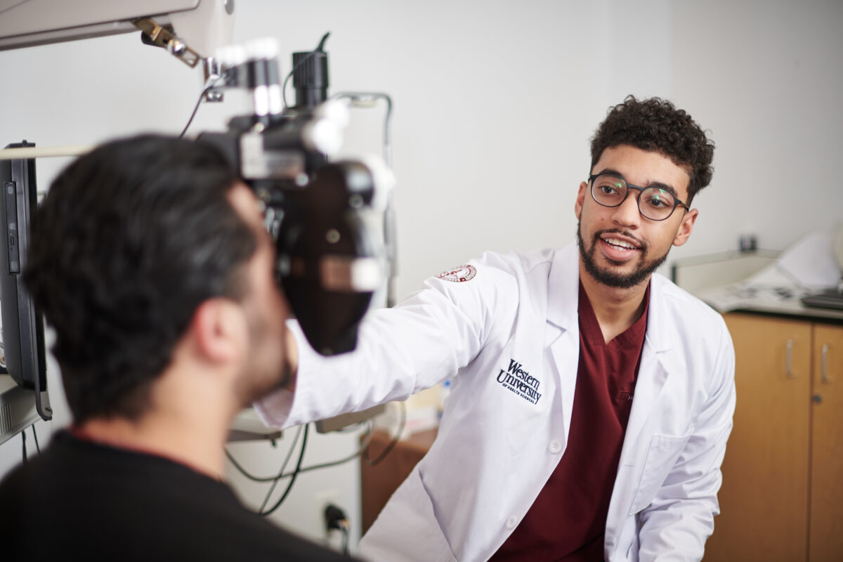 A doctor is examining a patient's eye.