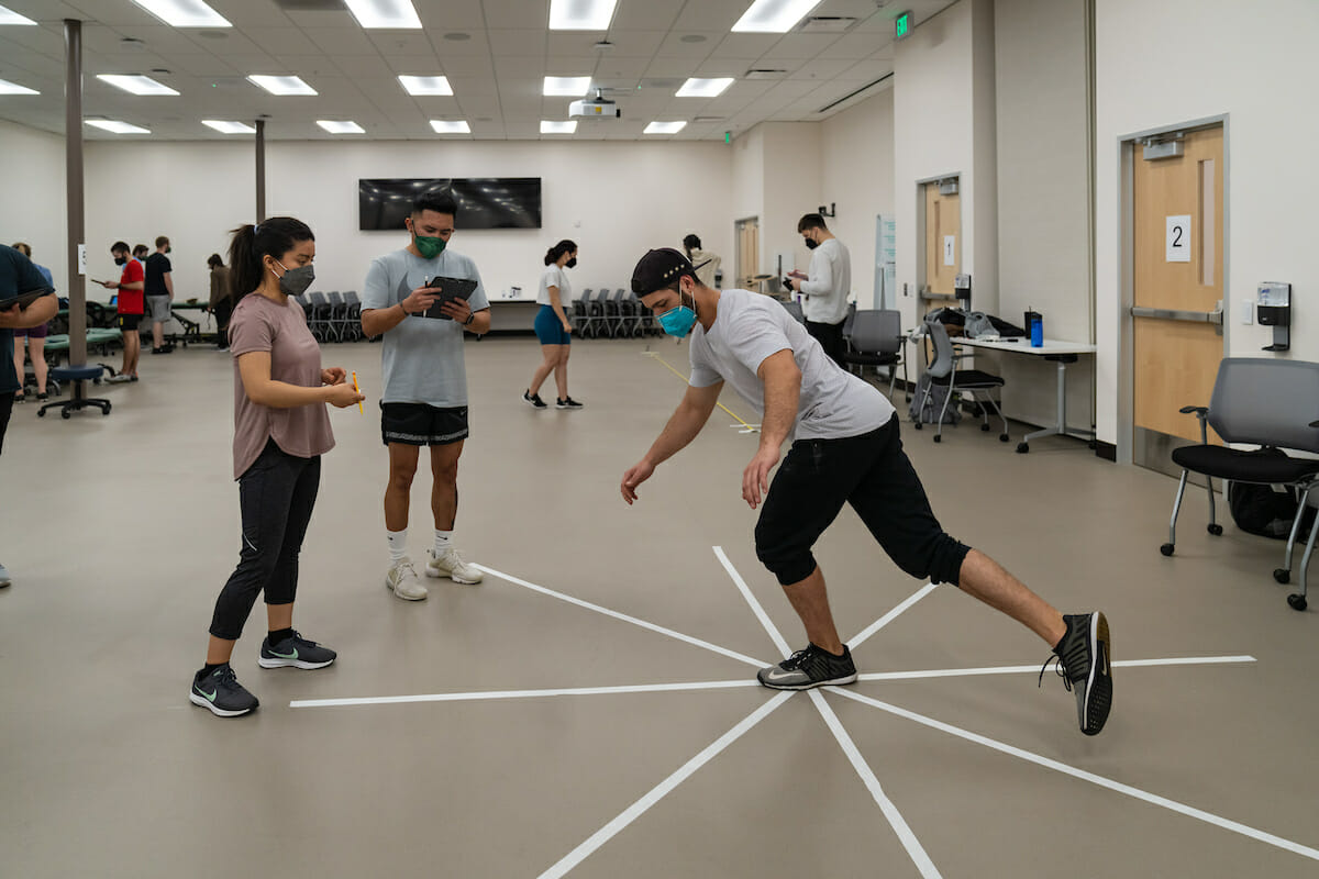 CHS-Northwest physcial therapy students participate in a hands-on musular skeletal return to sports testing lab led by Assistant Professor Chrsitina Gomez, PT, DPT and PT Lab Assistant Quinn Garner.