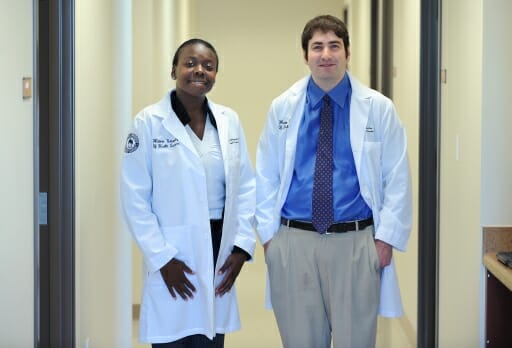 Dr. Funmi Olanipekun, left, and Dr. David Shofler are both instructors and faculty scholars (studying for an MSHS degree) for the Department of Podiatric Medicine