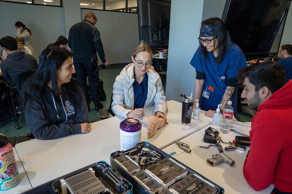 A group of people working together at a table.