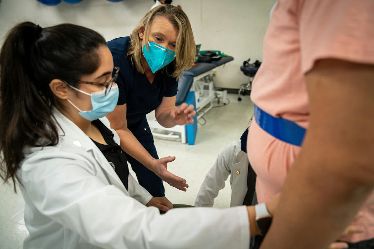 Third-year Doctor of Physical Therapy students participate in a Neuro 6015 hat provides them real patients to work with.