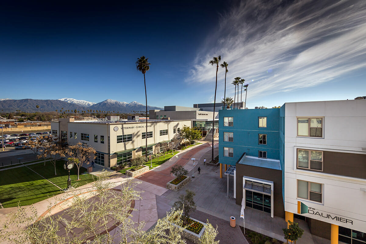 An aerial view of a mountainous campus.