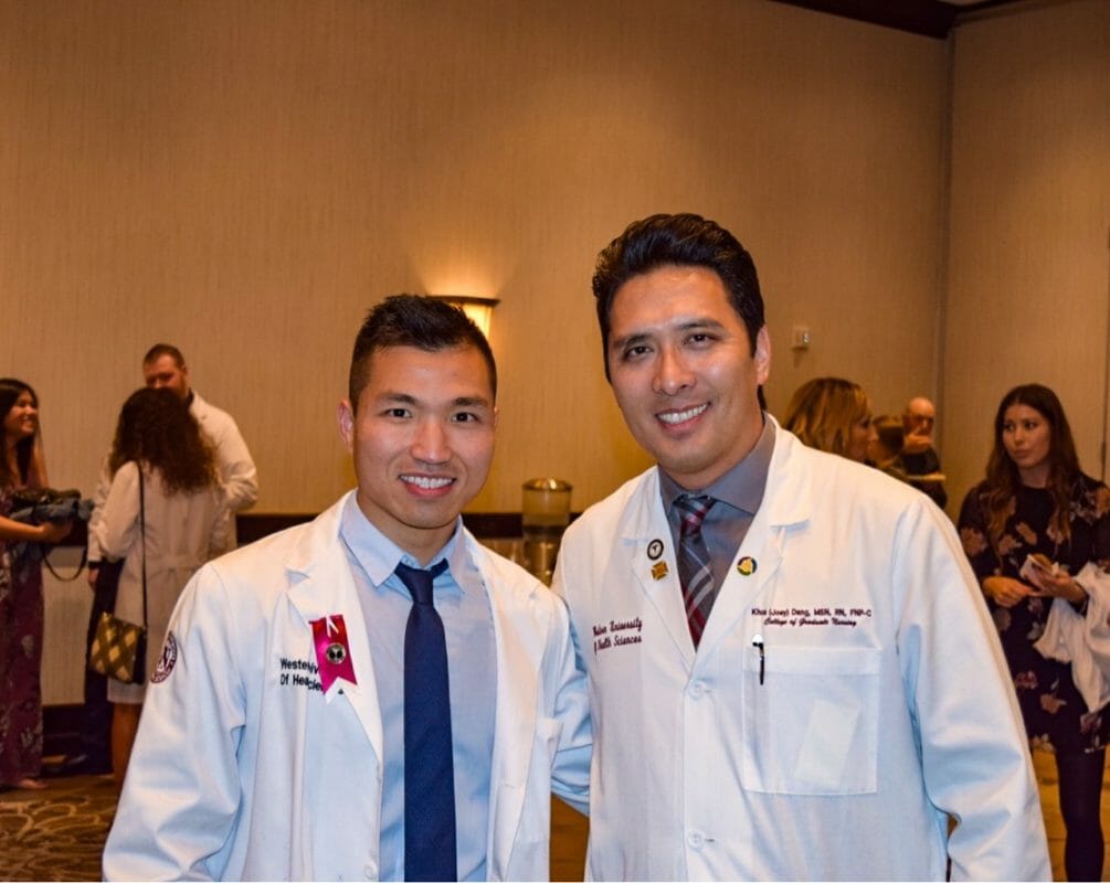 Two students in white coats