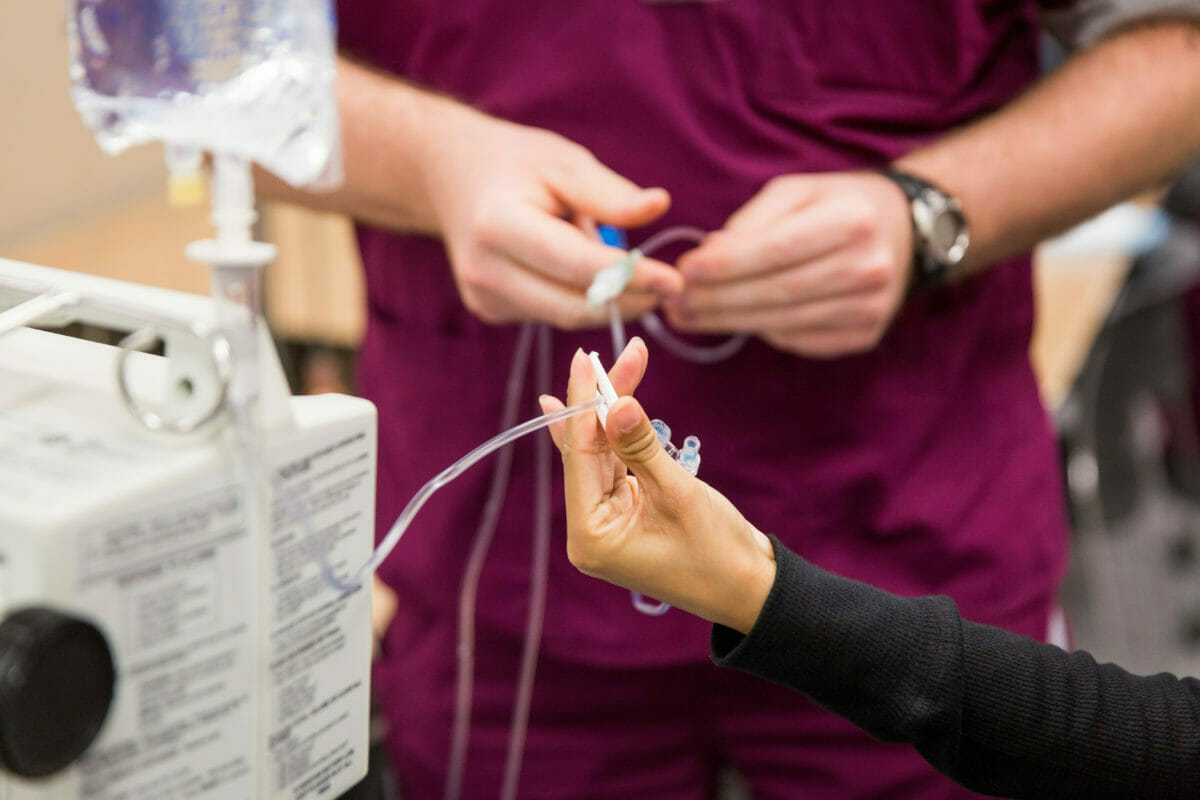 Two students CGN DNP with IV equipment