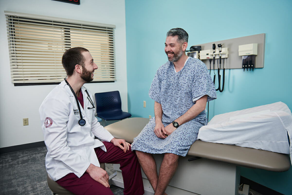 student with patient