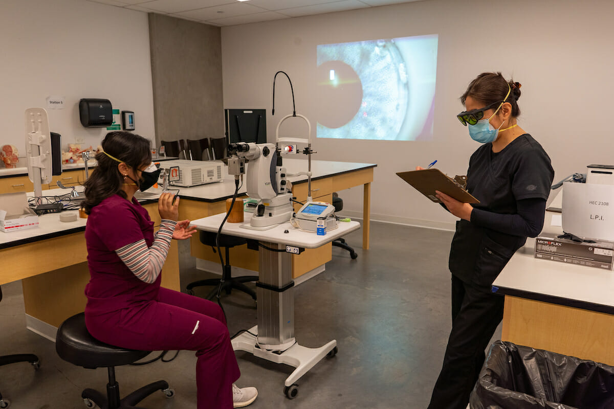 WesternU College of Optometry third-year students took part in a laser lab, going to four stations learning on the Lumenis laser and the Nidek laser. Assistant Dean for Clinical Affairs Loretta Ng with students Niloufar jafari and Johnny Pham at station 4 (YAG LPI) – A Nd:YAG laser is used to create small opening in the iris of patients to prevent or treat angle closure glaucoma.