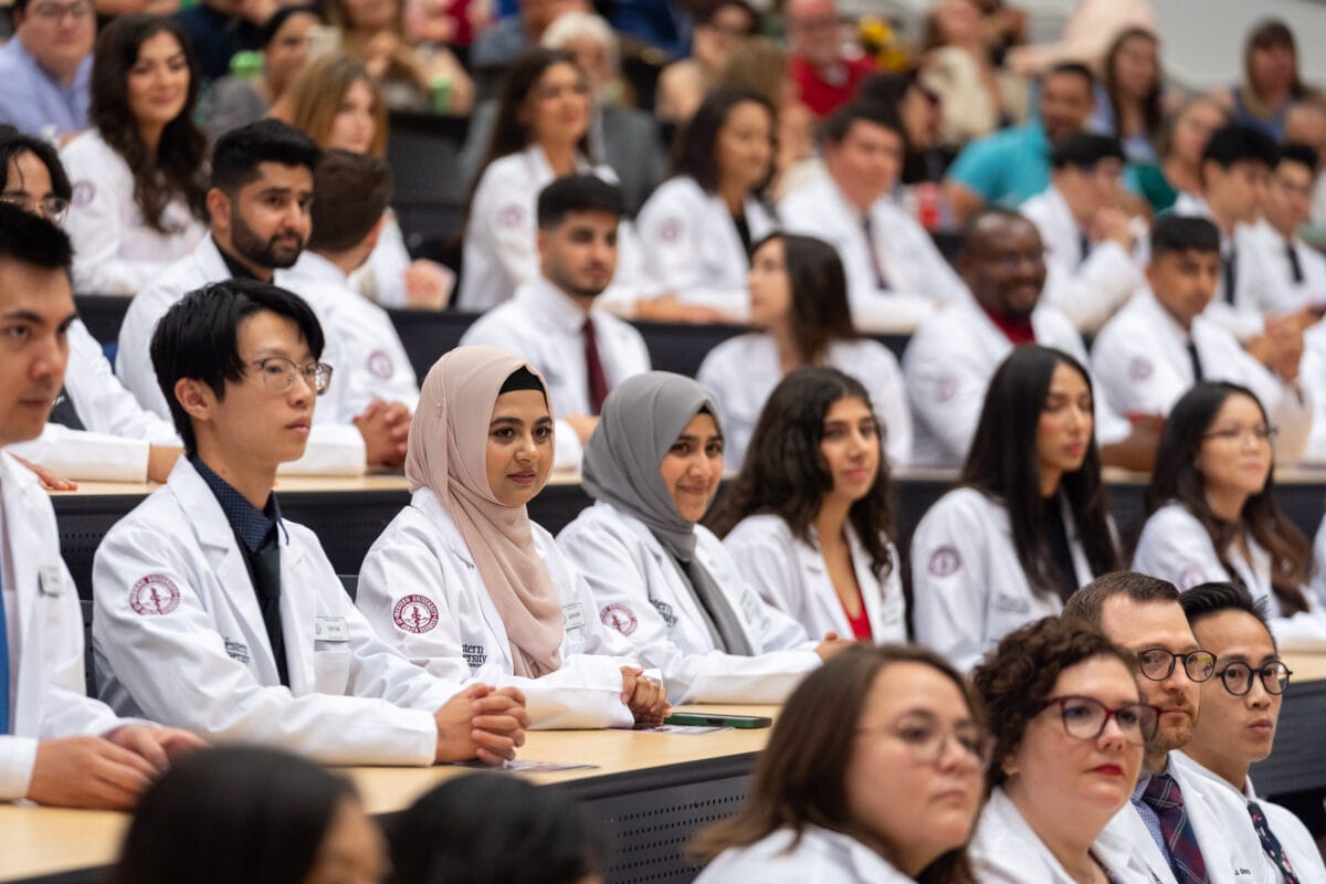College of Optometry incoming students walk the Esplanade during WesternU Welcome Week day