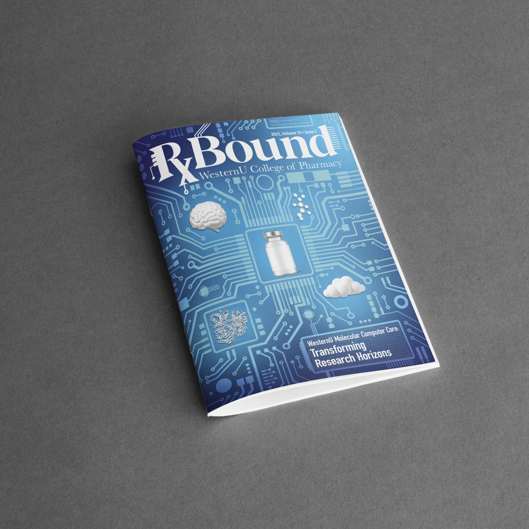 A magazine titled "RxBound," featuring a blue cover with technological and medical imagery, lies on a gray surface.