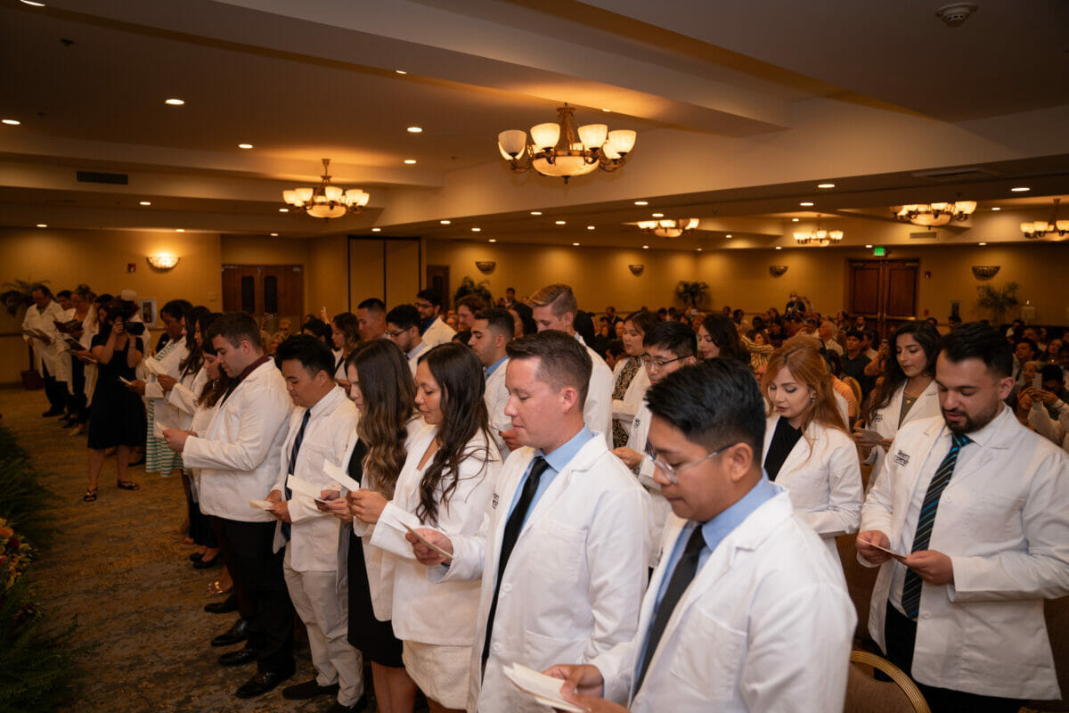 Medical professionals, laboratory setting.