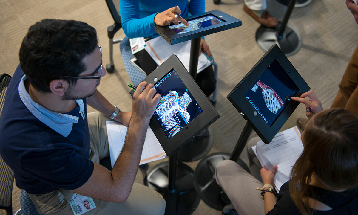 Image of dental students in the virtual reality learning center