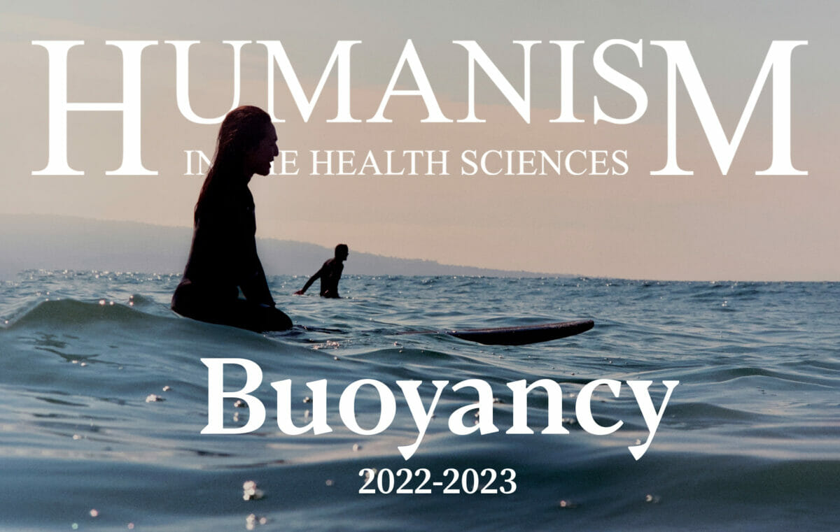 Surfer floating on a calm ocean at sunset text over image WesternU Humanism in the Health Sciences 2023 Buoyancy