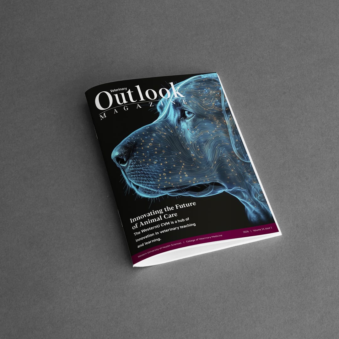 A magazine titled "Outlook Magazine" featuring a digital illustration of a dog's head with blue and gold circuitry on the cover, placed on a gray background.