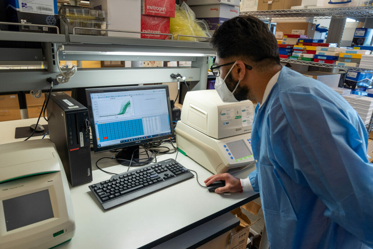 Student working with computer in laboratory