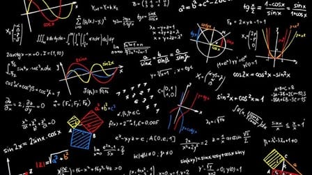 Chalkboard filled with various colorful mathematical graphs, equations, formulas, and trigonometric functions on a black background.