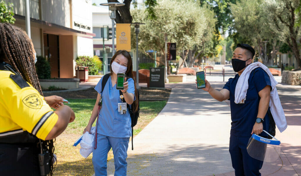 Students and guard on campus