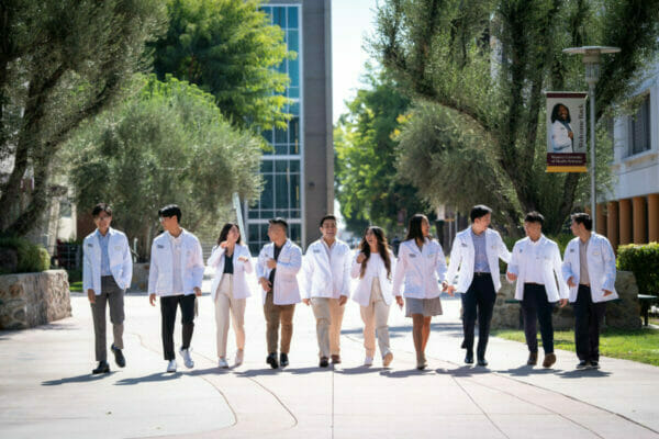 Group, students, white lab coats