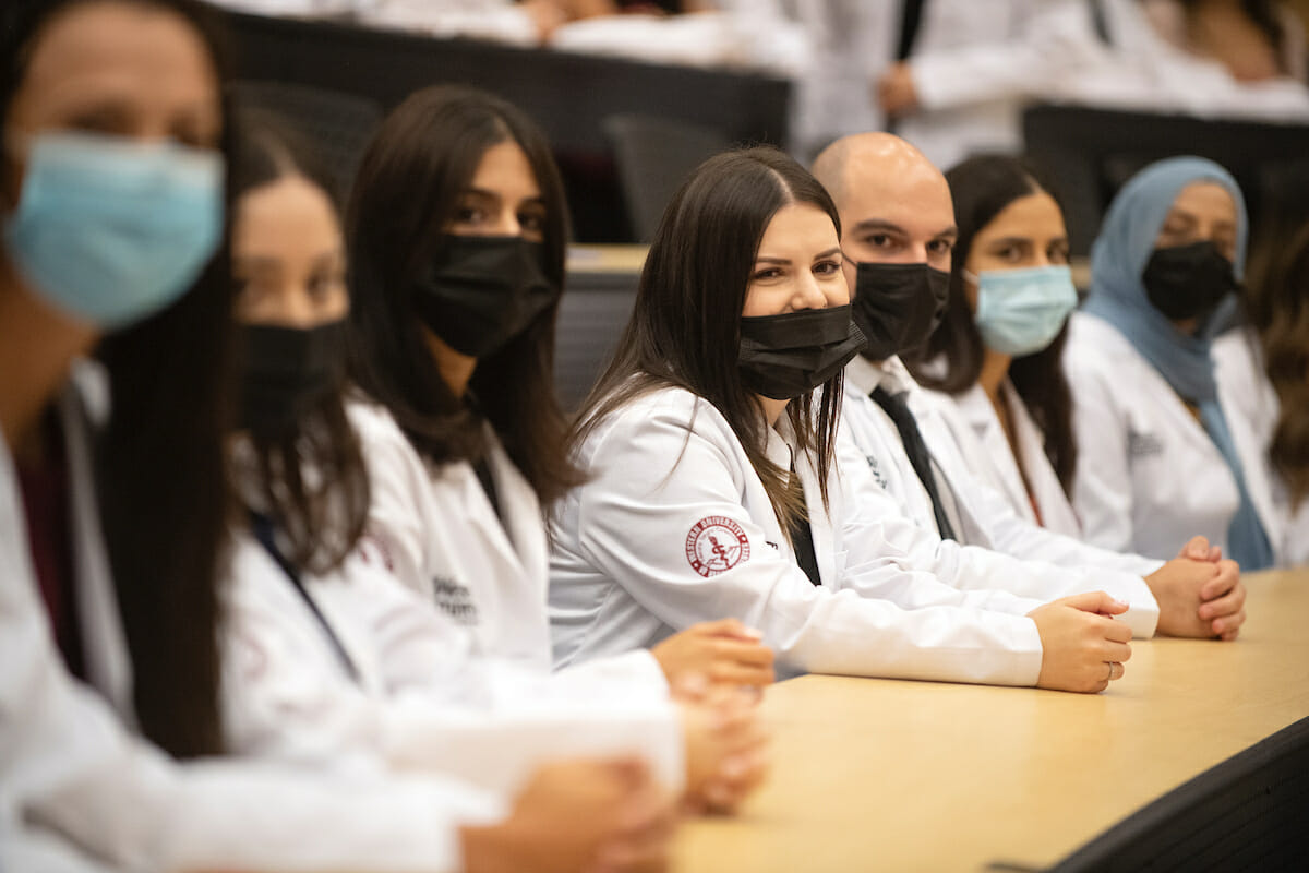 Students in a campus lecture hall.