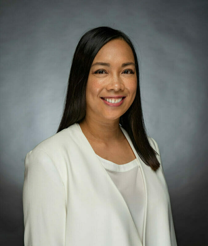 alumni with smile