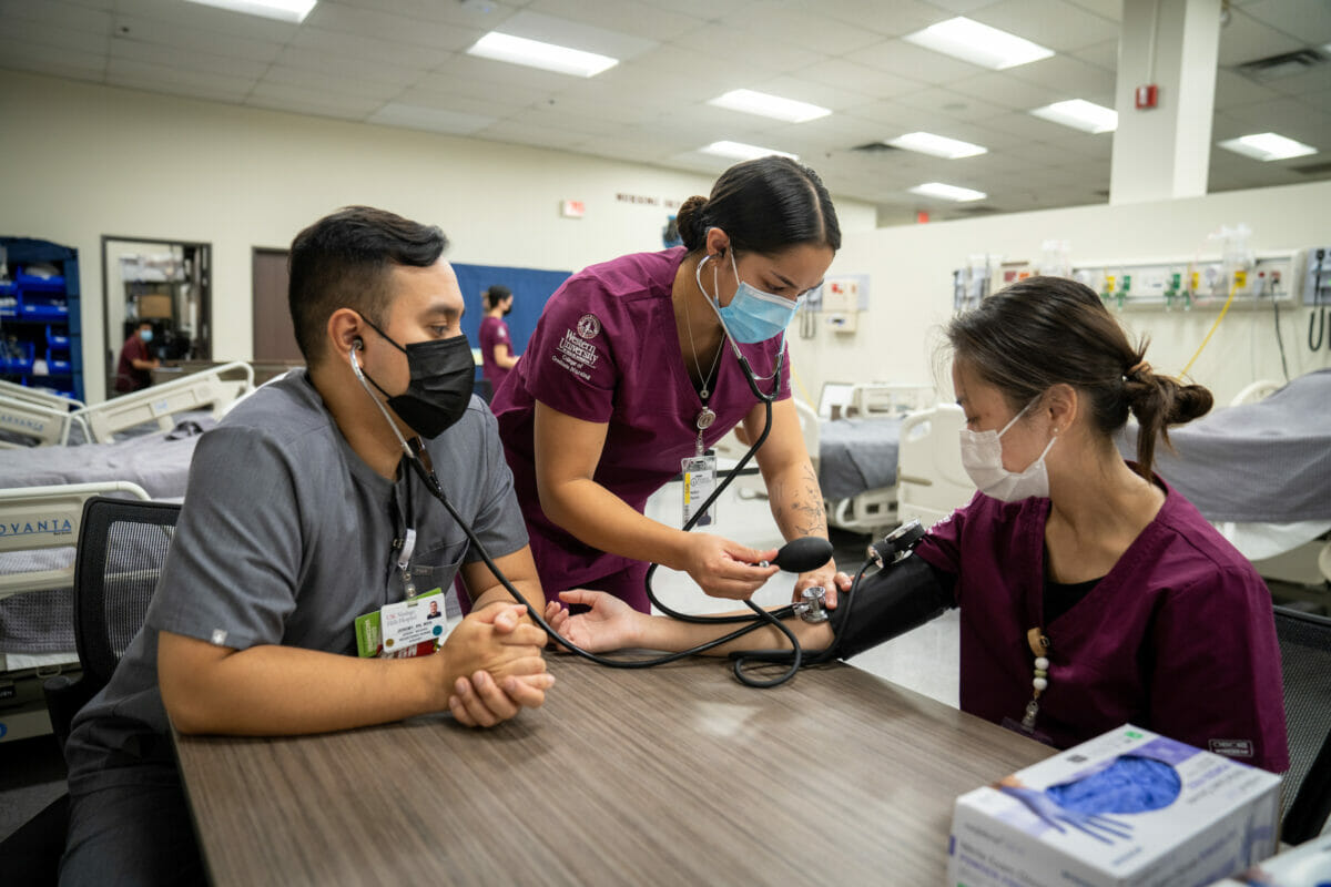Nursing students practicing skills