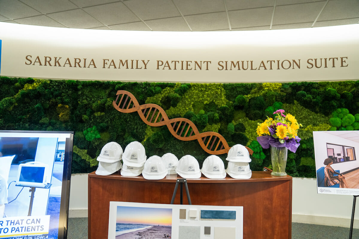 A hard hat tour of the unfinished Sarkaria Family Patient Simulation Suite was for in-person guests following the Pumerantz Lecture. The suite is inside the Health Profession Center on the Pomona campus. WesternU Contruction Project Manager Steve Vega led the tour.