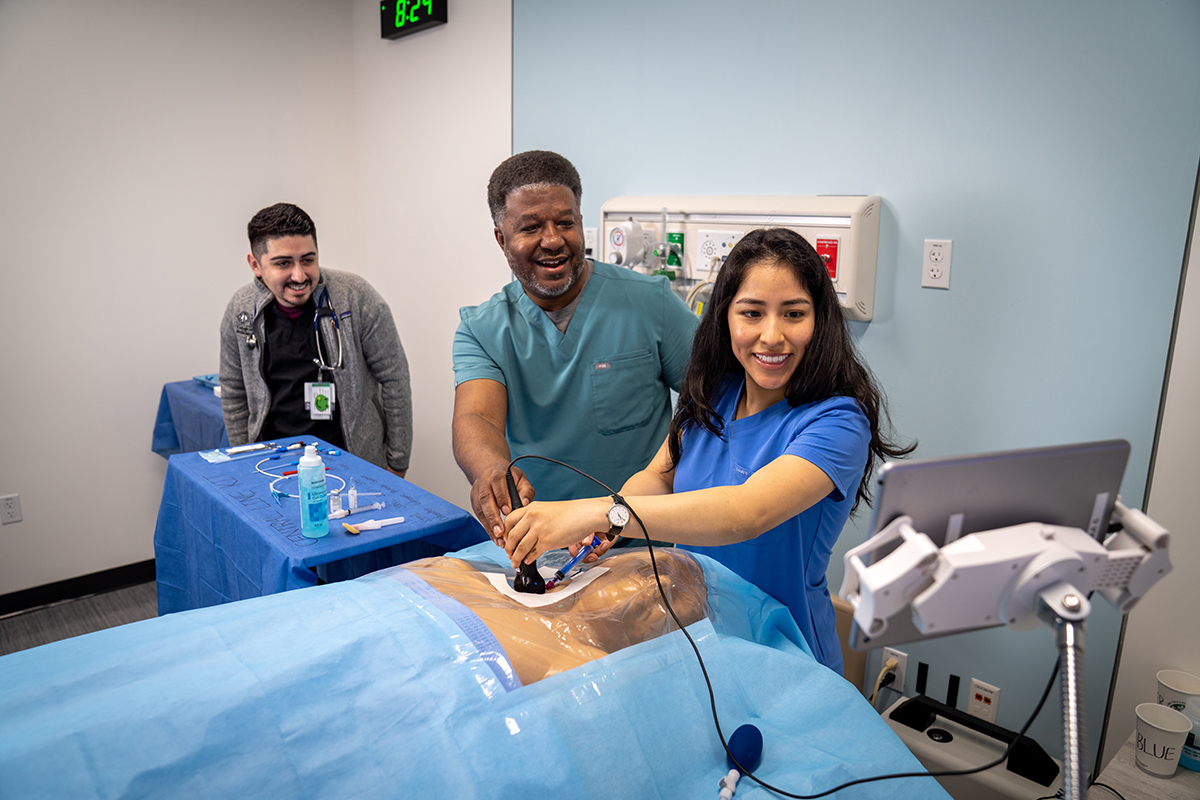 Medical students in a simulated hospital experience.
