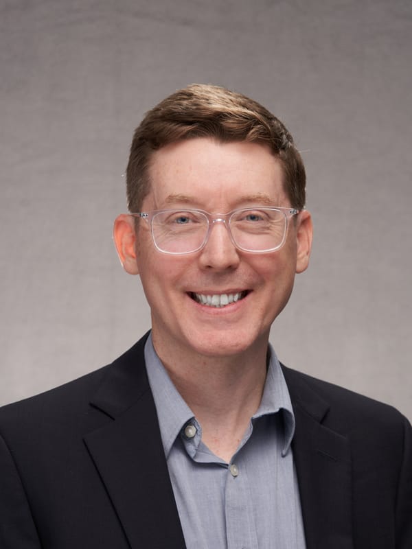 Portrait of Adam Huttenlocker