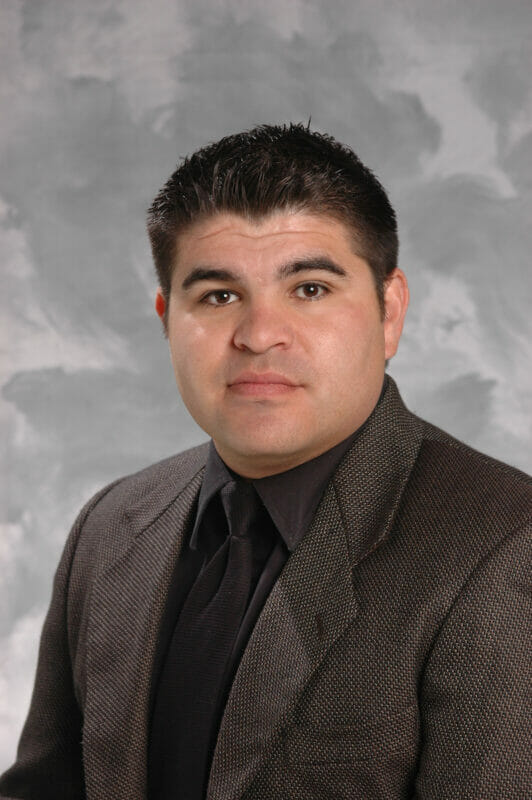 Portrait of Carlos Mendez, MBA, Management