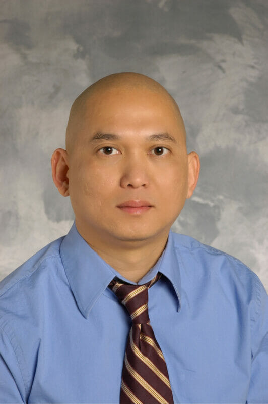 Portrait of Quang Le, PharmD, PhD