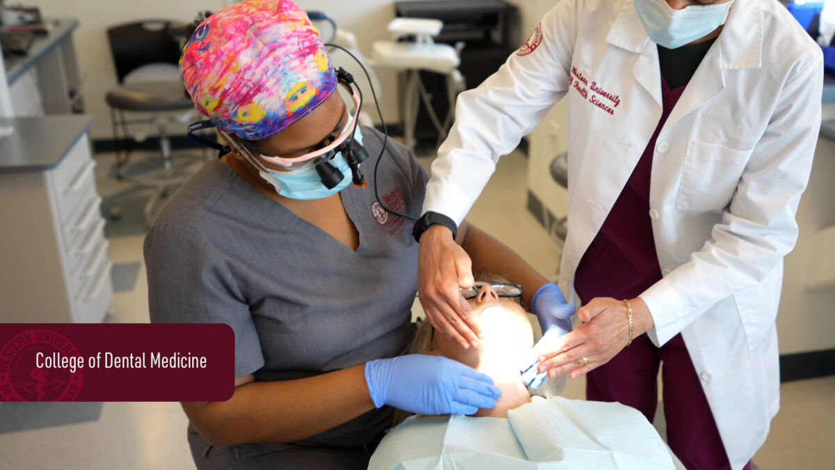 Image of students with patient.