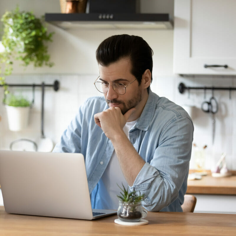 Man at desk with laptop